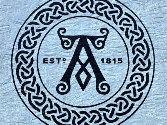 Ardbeg Distillery logo stencilled on an-exterior wall 