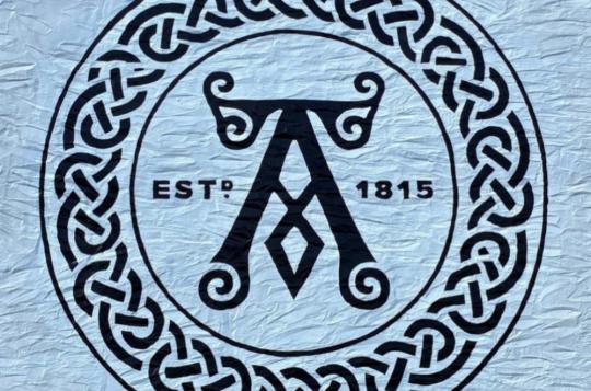 Ardbeg Distillery logo stencilled on an-exterior wall
