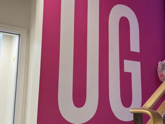 Floor level marked on wall with large letters denoting UG