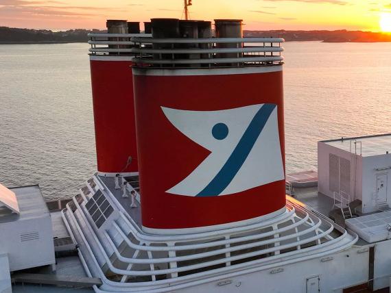 Fred Olsen logo stencilled on a ship funnel