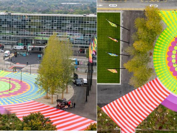 Overhead view of large mural installation using stencils 
