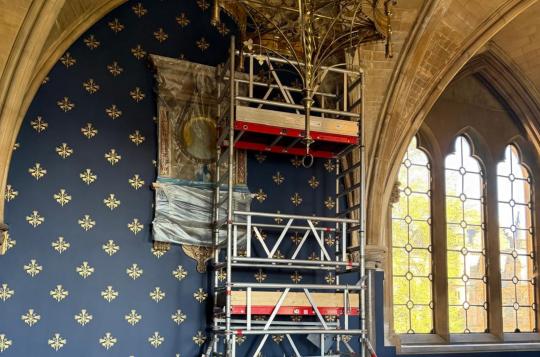 Decorative wall stencilling in progress at Glasgow University
