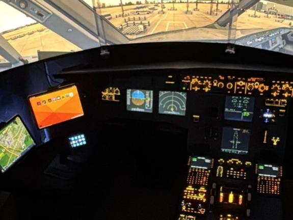 Looking out from replica A320 cockpit over the airport 