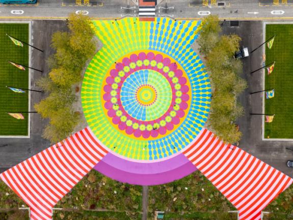 Overhead view of large mural installation using stencils 
