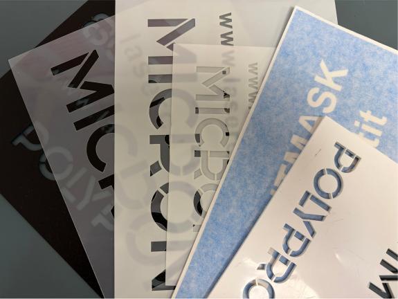 Ardbeg Distillery logo stencilled on an-exterior wall 