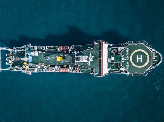 Extra large Helipad landing logo on ship at sea