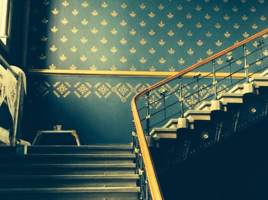 Grand staircase with stencilled walls in Glasgow