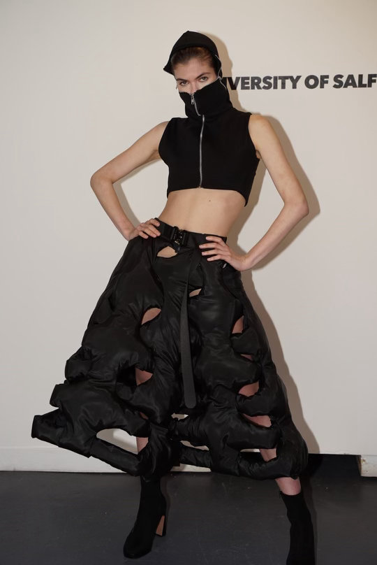 Model wearing dress ready to take to the catwalk