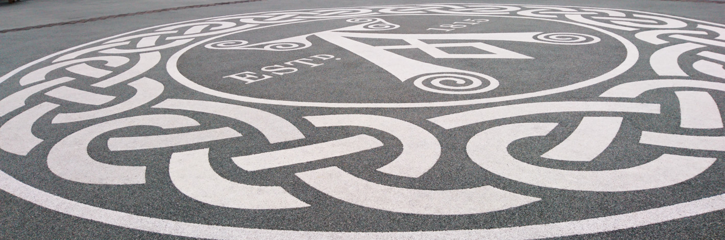 Large Ardbeg logo applied to the ground using a custom stencil
